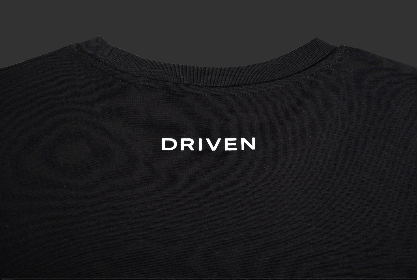 007 x SPYSCAPE T-Shirt - Close up view of back neck with Driven print