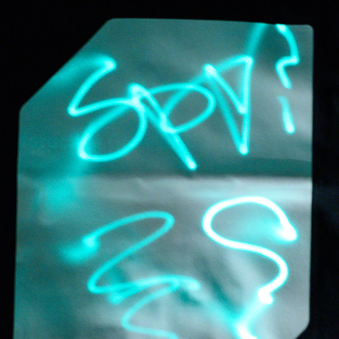 Super Green Glow Black Kids UV T-shirt with UV Keyring - Written example on shirt